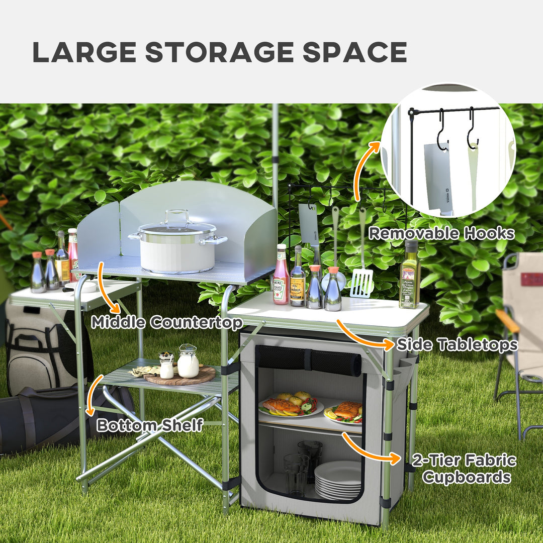 Outsunny Portable Camping Kitchen with Cupboard, Aluminium Folding Table with Windshield & Light Stand, Includes Carrying Bag