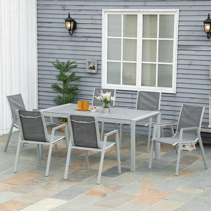 Outsunny 7 Pieces Garden Dining Set, Outdoor Table and 6 Armchairs, Aluminium Frame Slatted Wood Grain Plastic Top Table Mesh Fabric Seats Light Grey