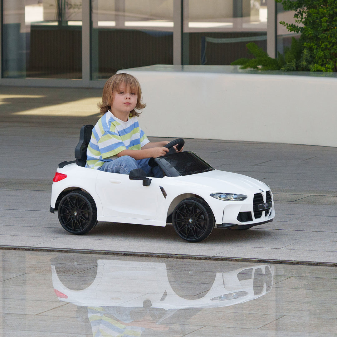 AIYAPLAY 12V BMW M4 Licensed Kids Car with Easy Transport, Remote Control, Suspension, Music, Horn, LED Lights - White