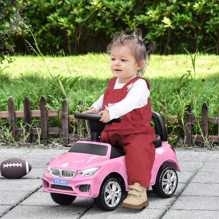 HOMCOM Baby Toddler Ride On Car, Foot to Floor Slider with Horn, Music, Working Lights, Storage, Big Steering Wheel, Pink