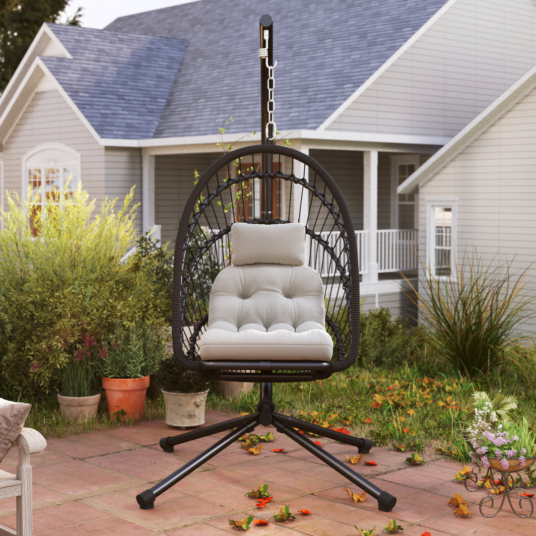 Outdoor PE Rattan Swing Chair with Foldable Basket and Cushion, Garden Patio Hanging Egg Chair with Metal Stand, Headrest for Indoor and Outdoor, Black